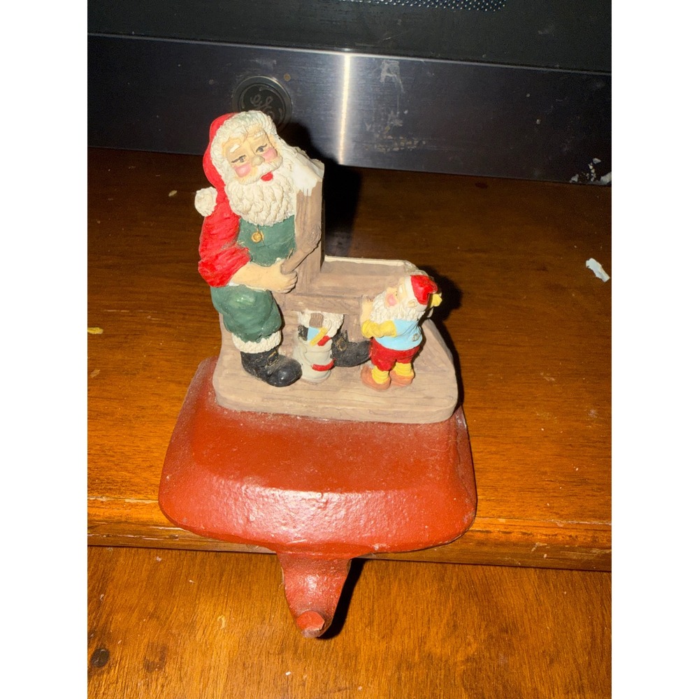Vintage Cast Iron Santa Claus and Elf Workshop Christmas Stocking Hanger Holder